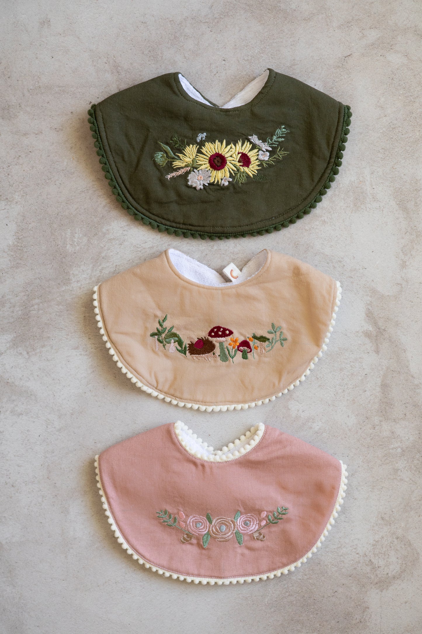 Round Bib- Mauve Linen Flower embroidery