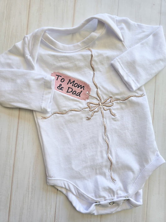 Embroidered "gift" onesie