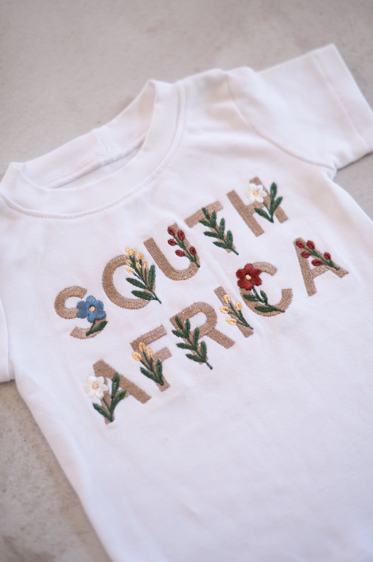 Embroidered South Africa with floral motif T shirt (Only)